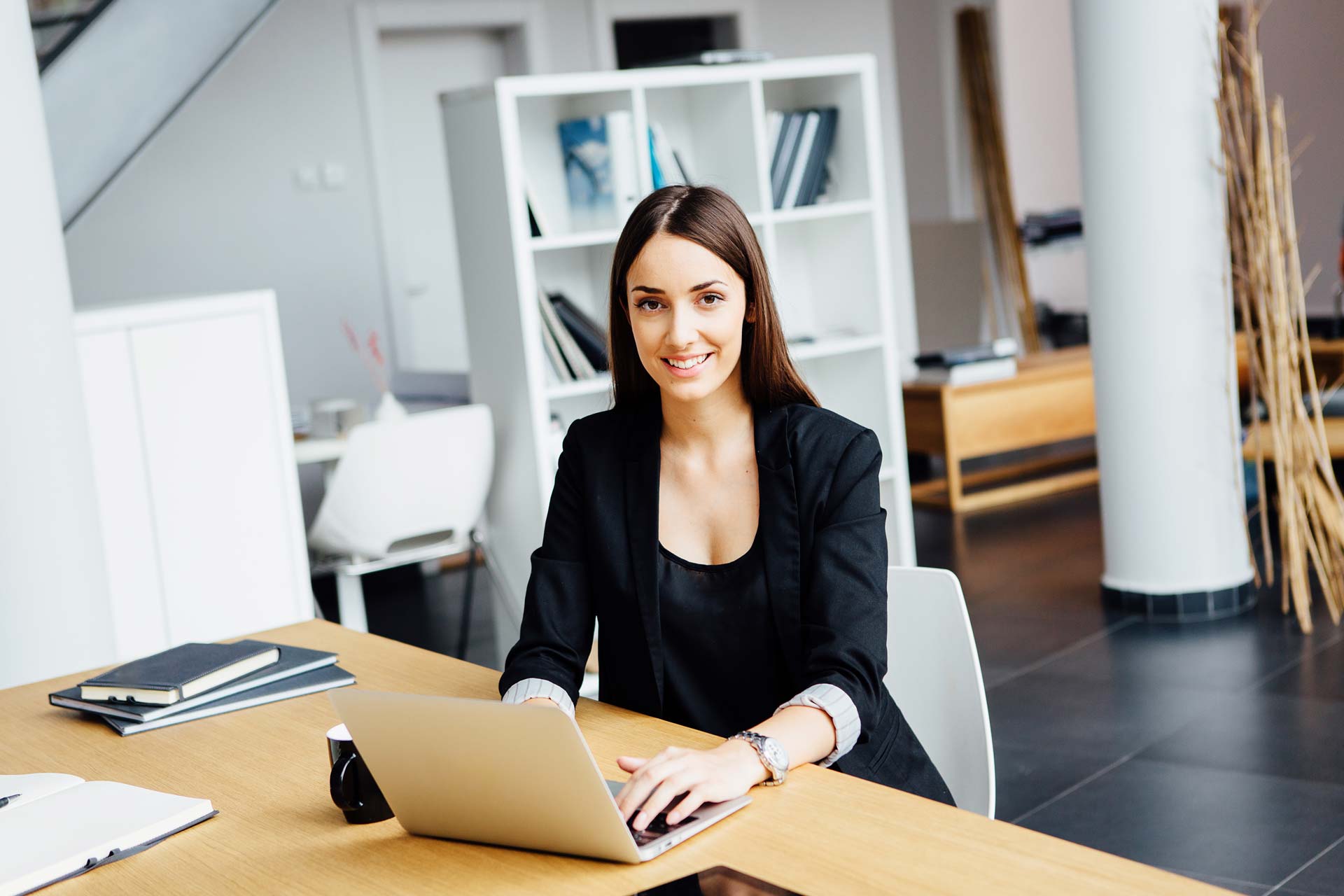 Young business woman in office